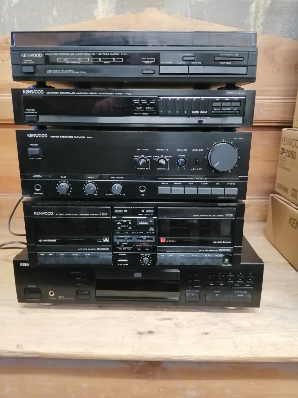 A boxed Kenwood, tuner, turntable, cassette deck, CD player and amplifier.